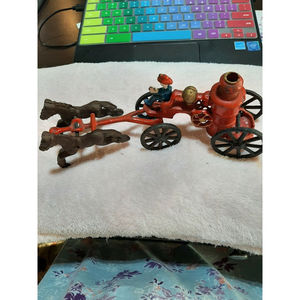 vintage cast iron toys , horses pulling fire engine pumper .1930/1940 w/sticker